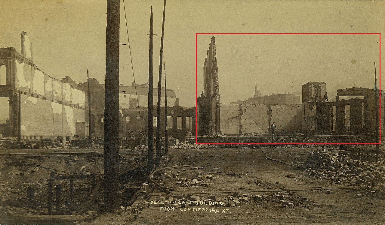 Aftermath_of_the_fire_of_June_6,_1889,_looking_north_on_1st_Ave_S_at_Yesler_toward_the_ruins_o...jpg