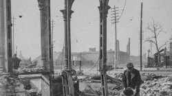 1871 Chicago. A man pours cold water on a still-hot safe after the fire