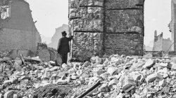 1871 Chicago. A man stands amid the ruins of the Union Depot